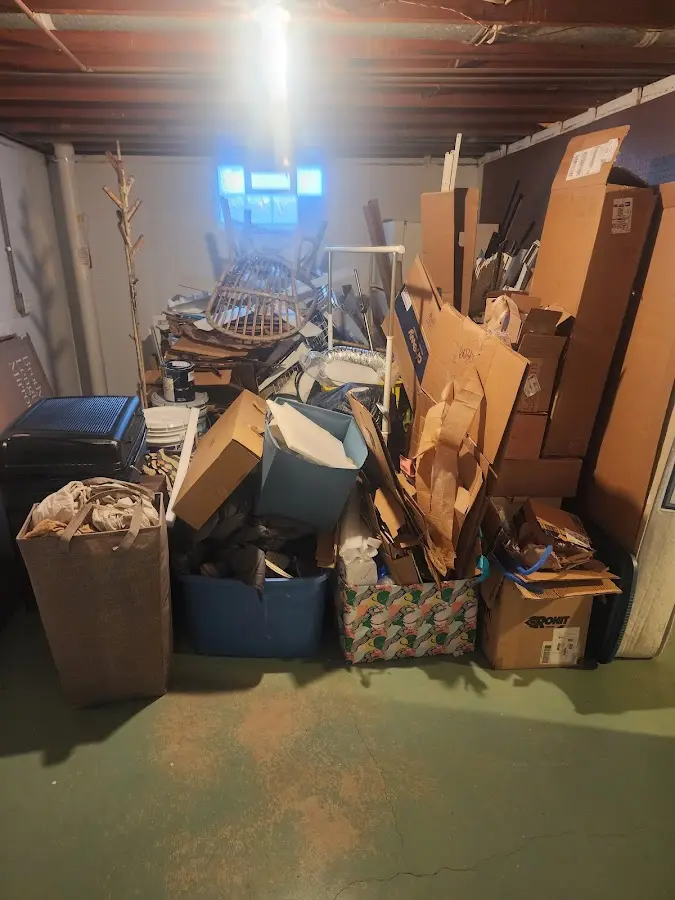 Roll-off dumpster container at job site for Yard Waste Dumpster Rental in Provincetown